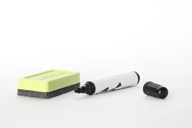 whiteboard accessories, an array of, marker, sponge, marker, marker, marker, marker, marker. Capturing workshop decisions after the whiteboard session