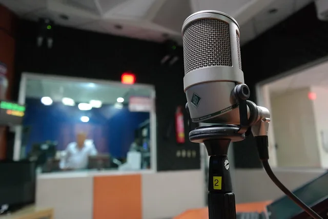 microphone, study, radio, live radio, music, recording studio, singer, radio, radio, radio, radio, radio. Evaluating live captions and recordings
